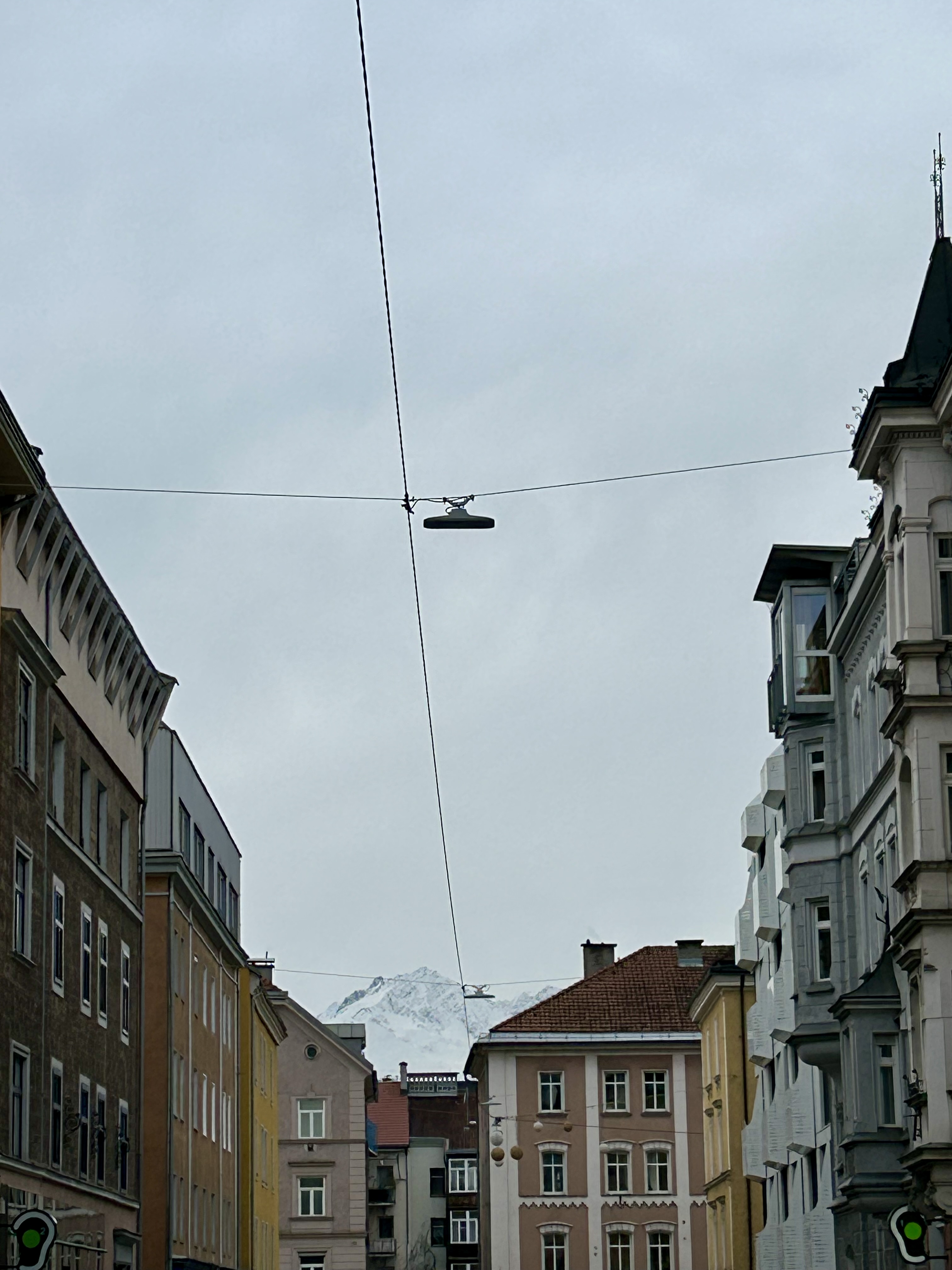 Innsbruck street with snowy peak